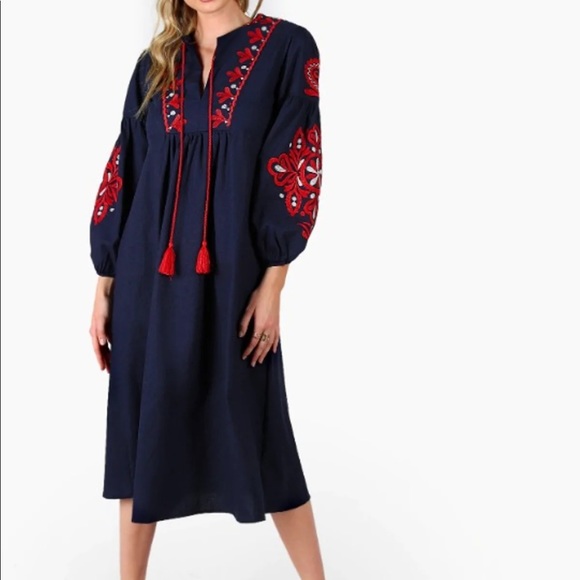 Dresses & Skirts - Embroidered midi tassel dress.